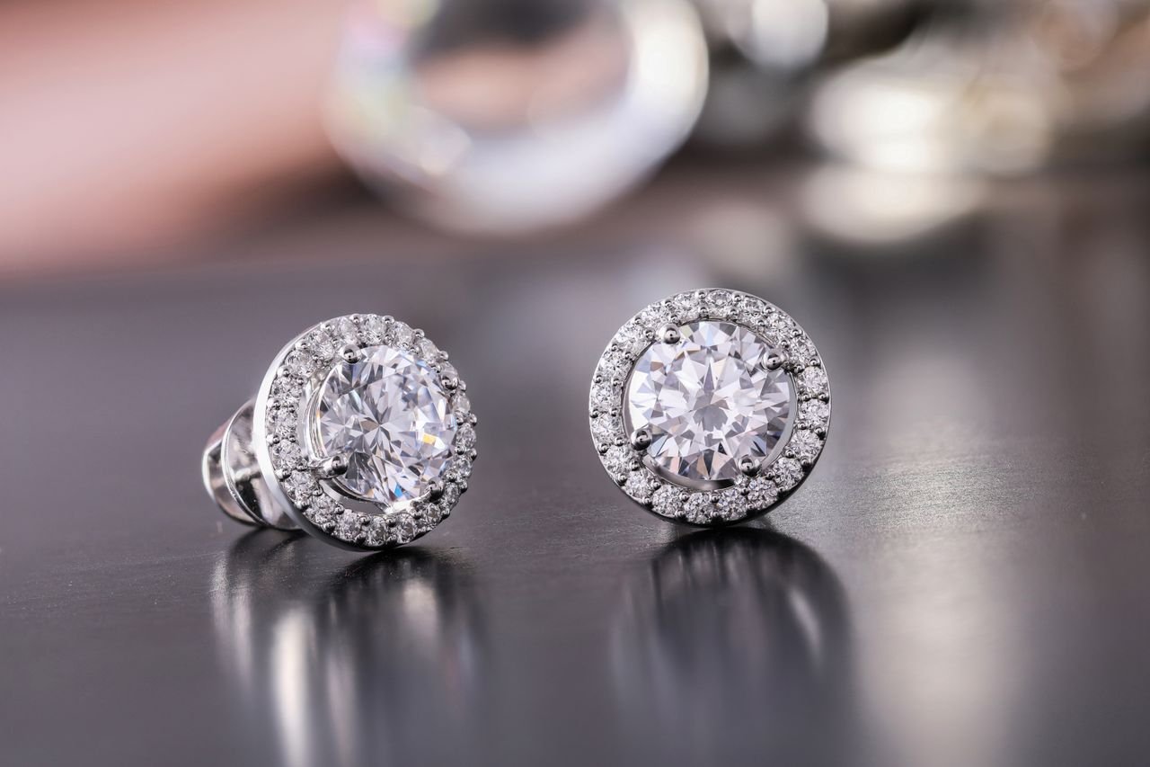 hero-img-01 Luxurious diamond earrings with sparkling stones, showcasing elegance and style.